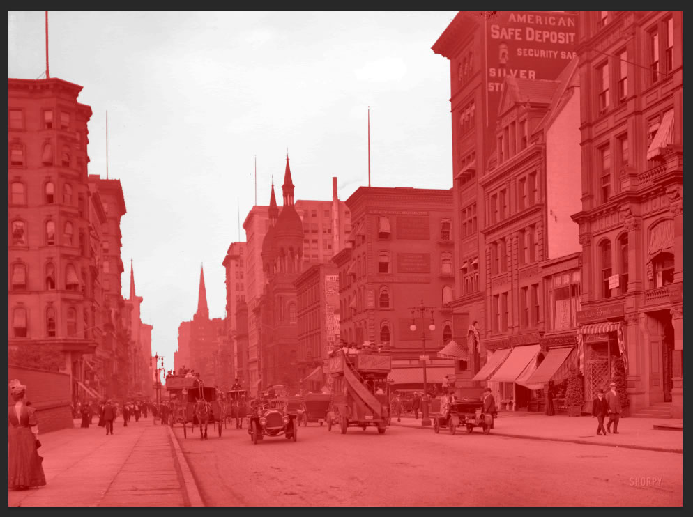 A screenshot of the sky removed and buildings in an old town selected using a quick mask, which highlights in red.